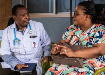 Dr Yohana Mokiwa with a patient, Dar es Salaam, Tanzania